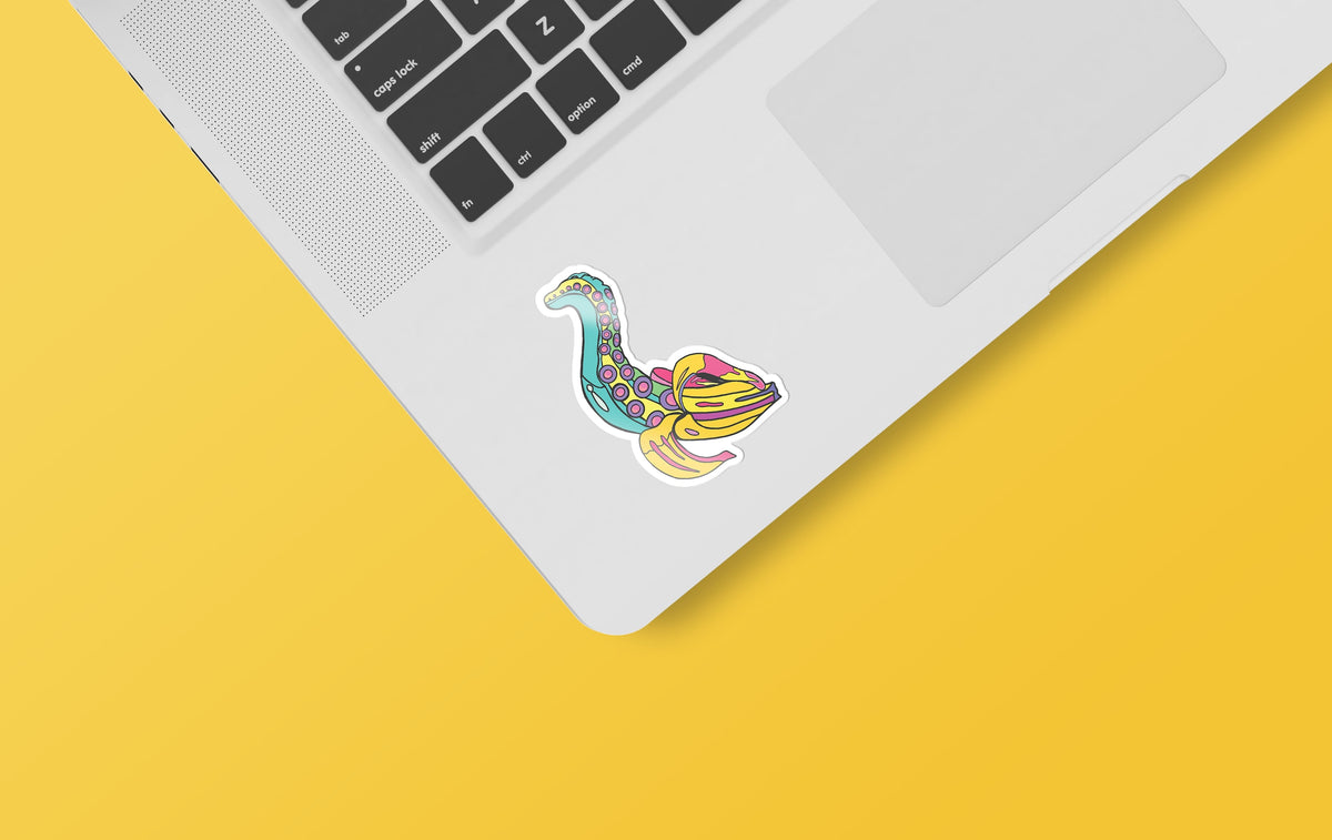 A 4&quot; laptop with a Tentacle Banana sticker from KosmicSoul on it.
