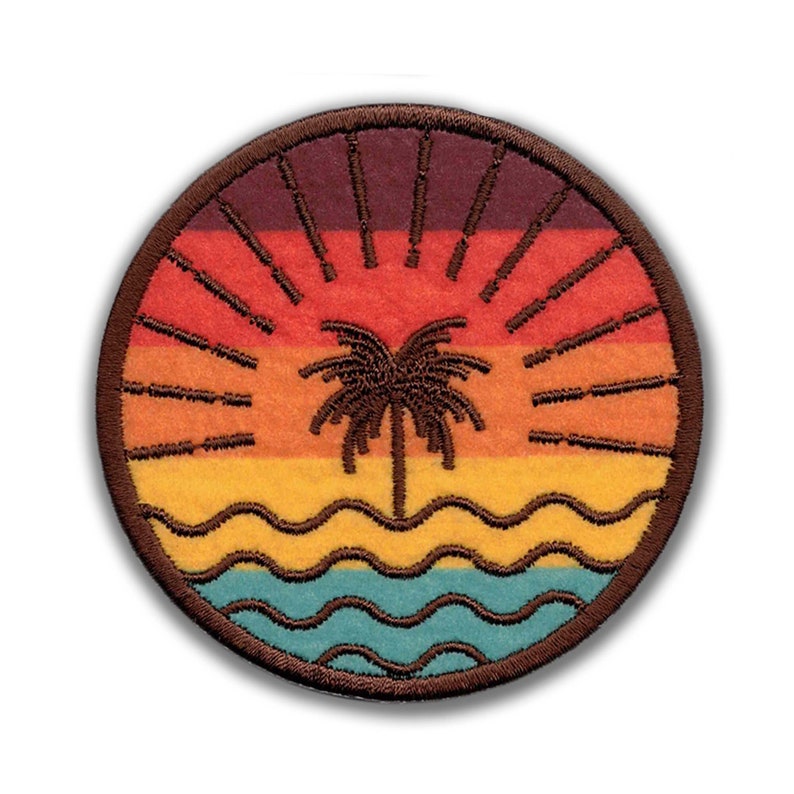A Beach Sunset Patch with a palm tree and waves, perfect for sewing on or ironing on, from the brand KosmicSoul.