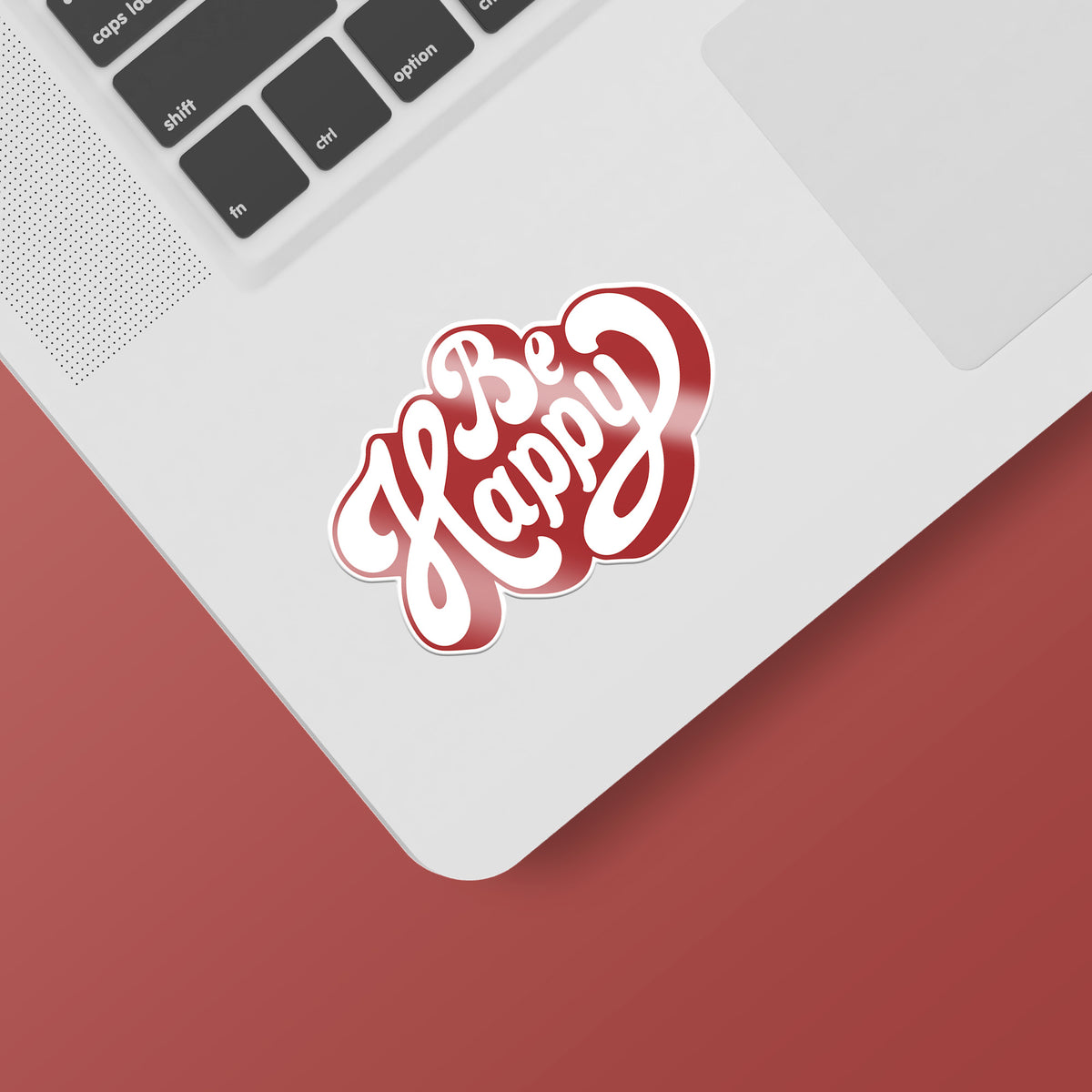 A happy KosmicSoul laptop with a matte finish, featuring the Be Happy Sticker.