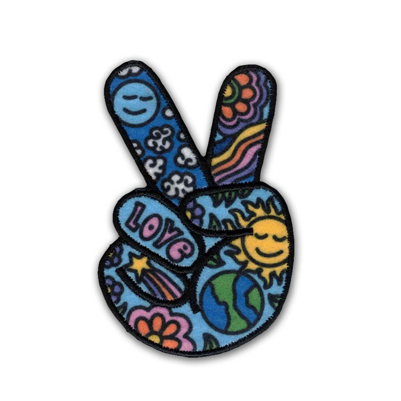 A KosmicSoul Peace Sign Patch sewn on it.