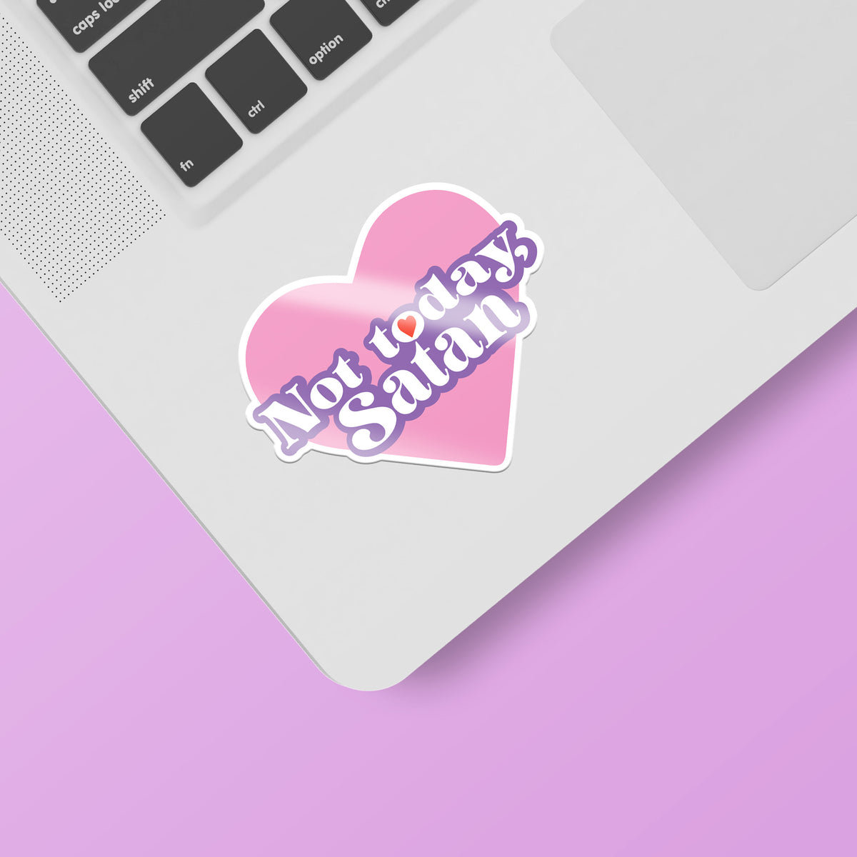 A laptop with a pink Not Today Satan sticker by KosmicSoul on it, featuring a matte finish.